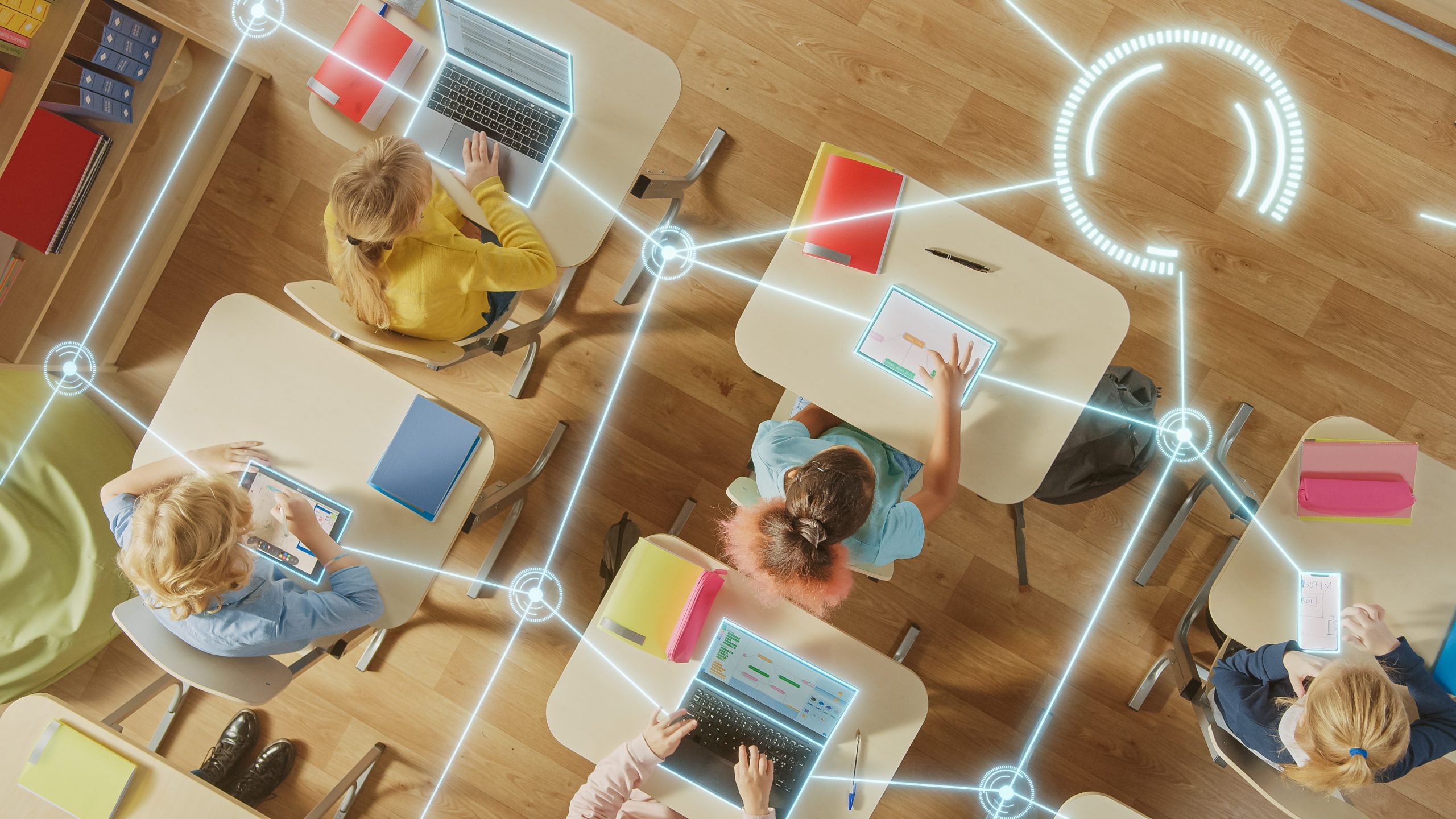 Kids in classroom with hteractive learning technology